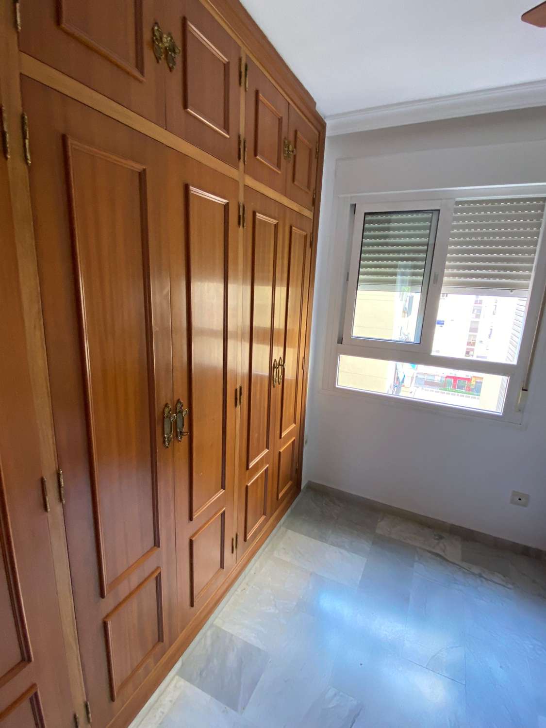 Spacious apartment with 4 bedrooms and 2 bathrooms, garage and storage room.